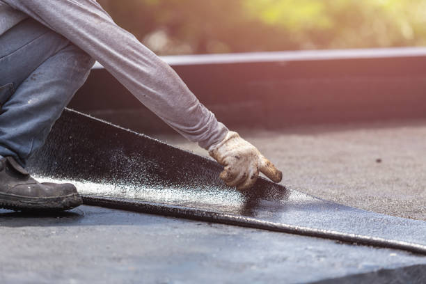 Professional Waterproofing technician working in Brant, MI